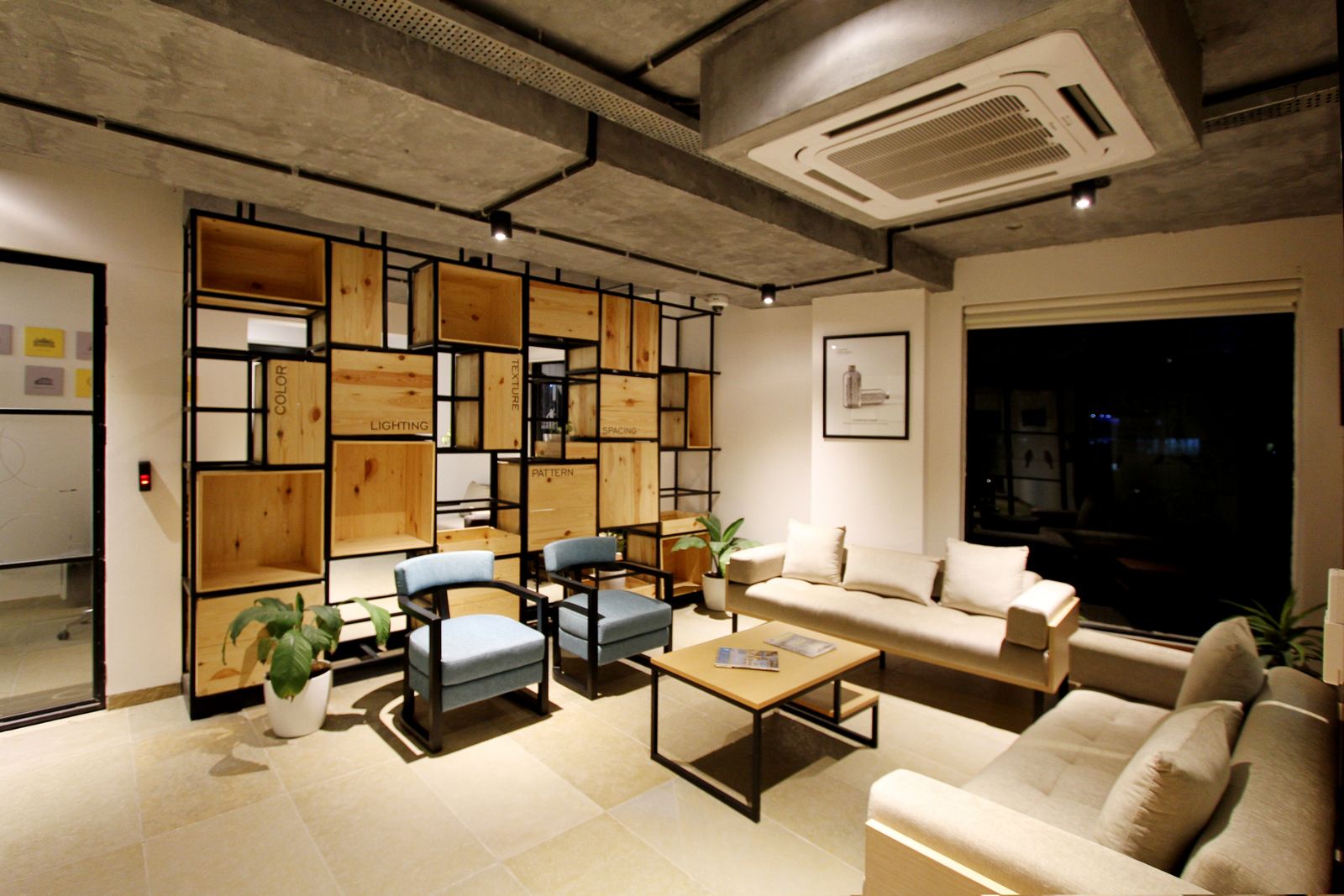 Industrial lounge with timber shelf grid