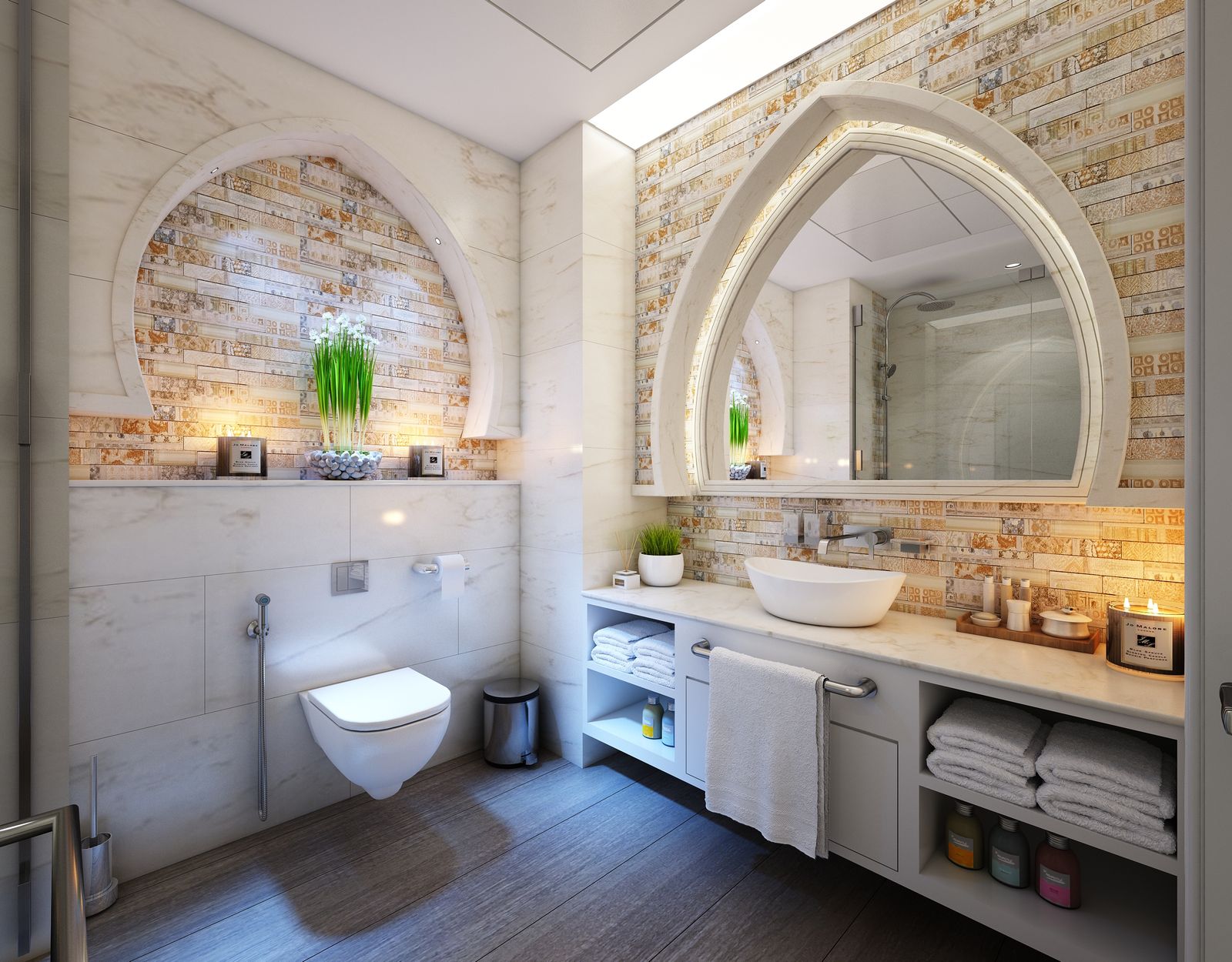 Boutique bathroom with arched mirror